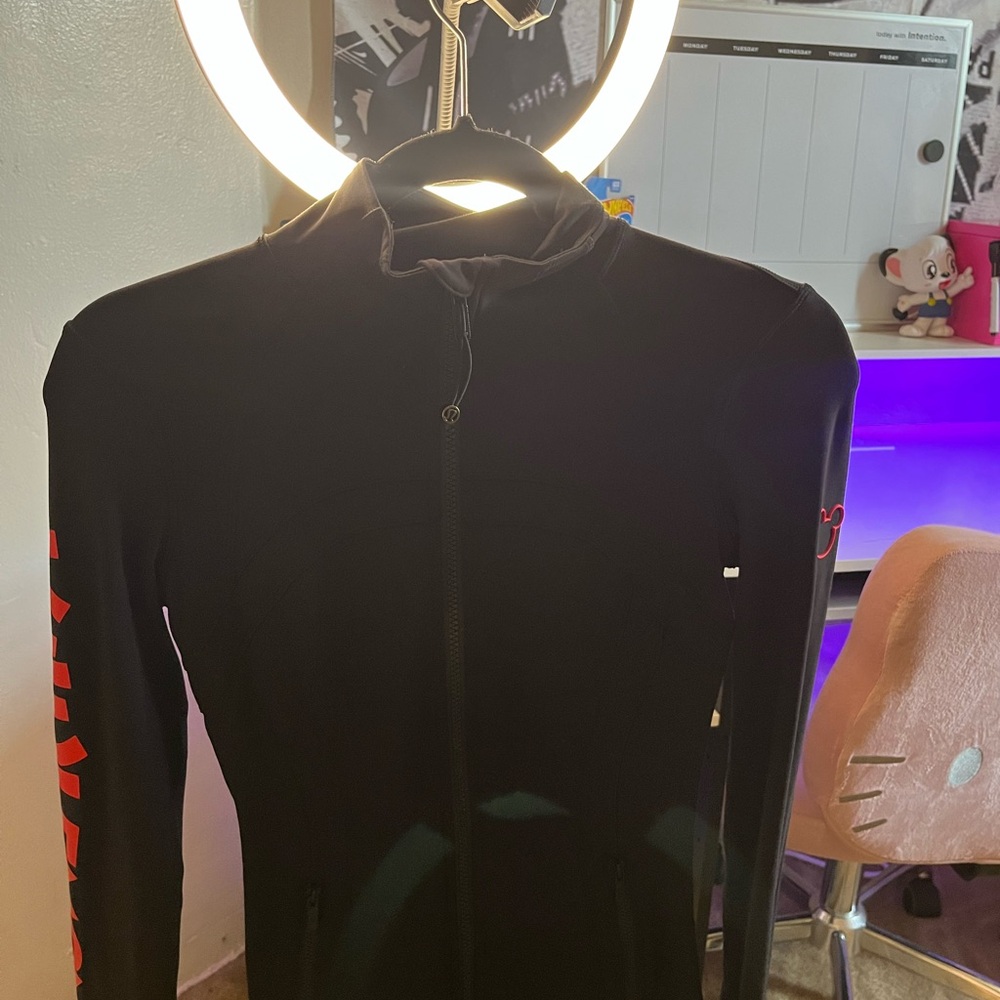 Lululemon size 4 Disney Black Performance Jacket Sleek Design